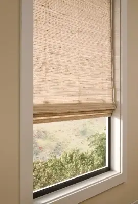 Alta natural woven shades in a sunroom
