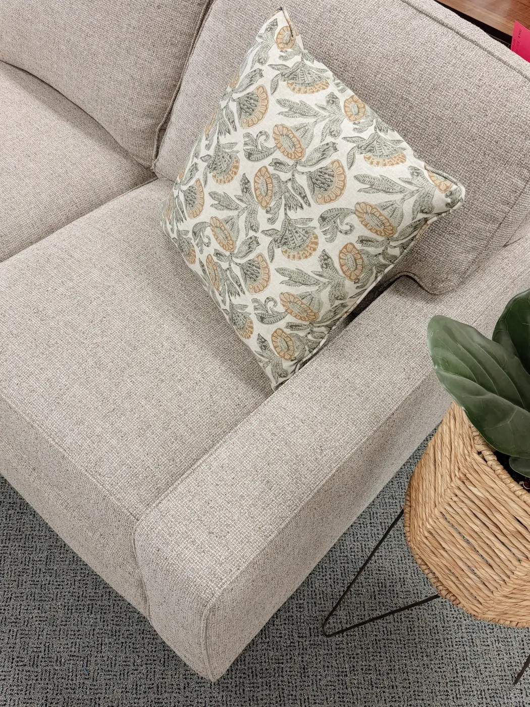 Upholstered sofa with accent pillow at Northwest Decor & Furniture in Sheldon, IA